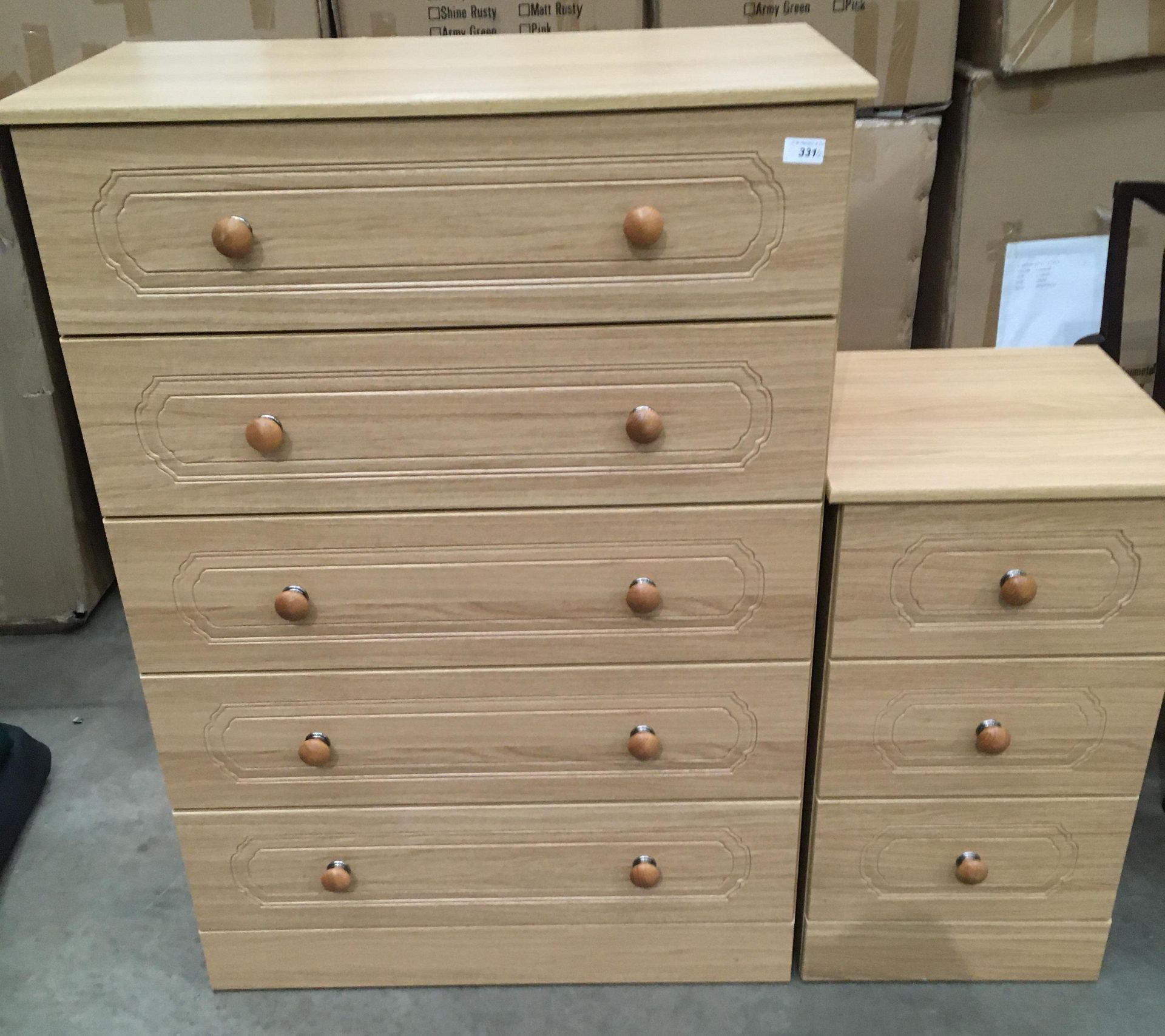 A Consort light oak five drawer chest of drawers 84 x 115cm high and a matching three drawer chest