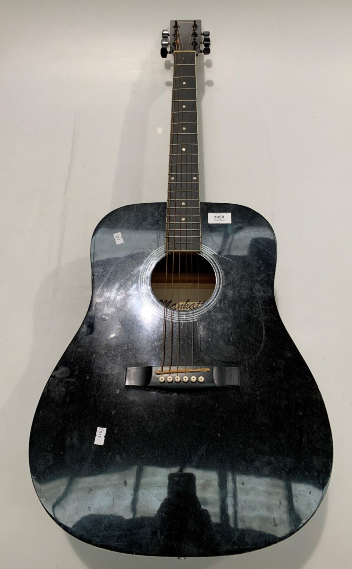 A Manhattan model SW203BK-EQ hand made western six string acoustic guitar
