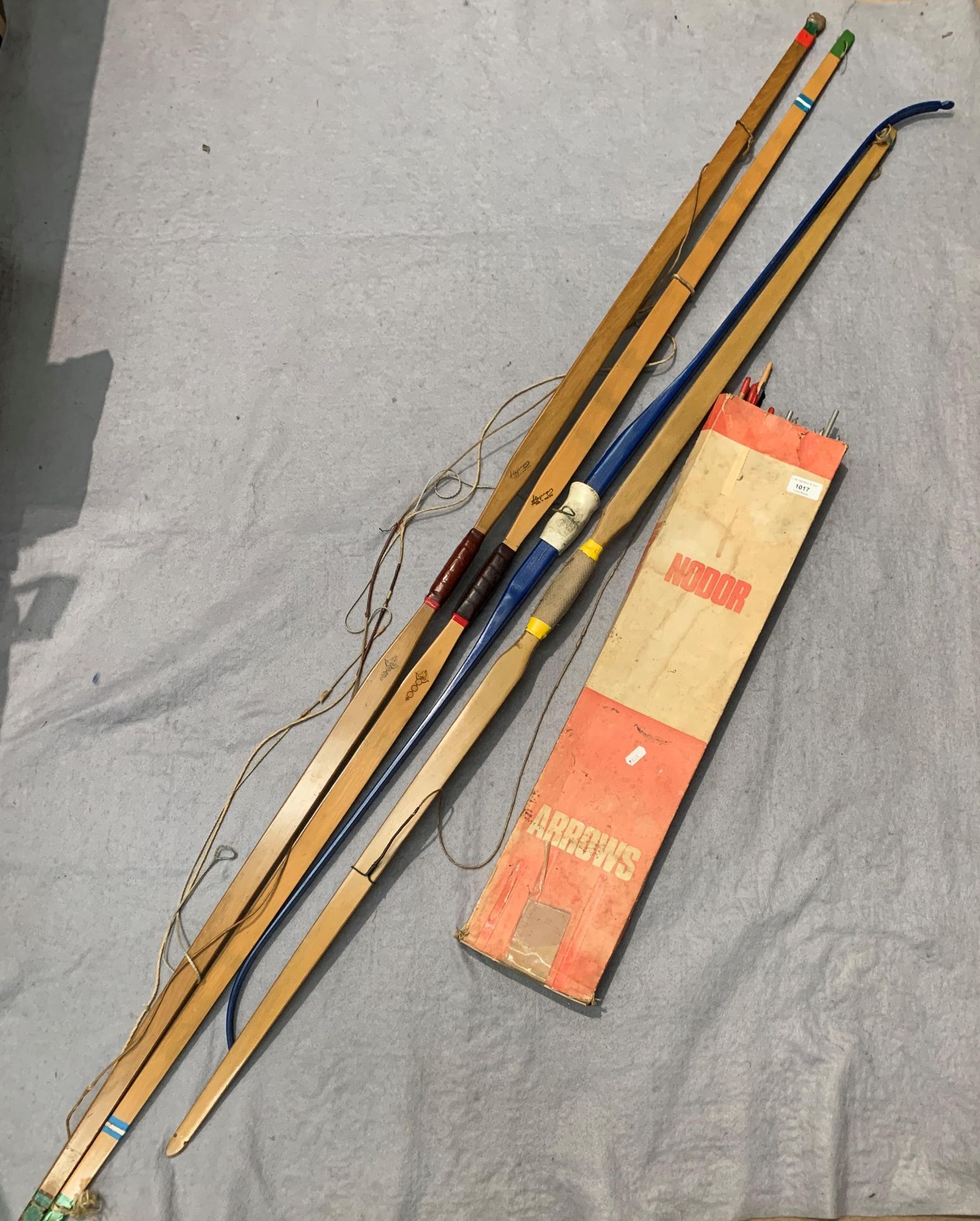 Contents to box - a quantity of Nodor and other Archery arrows and four various bows in a bag