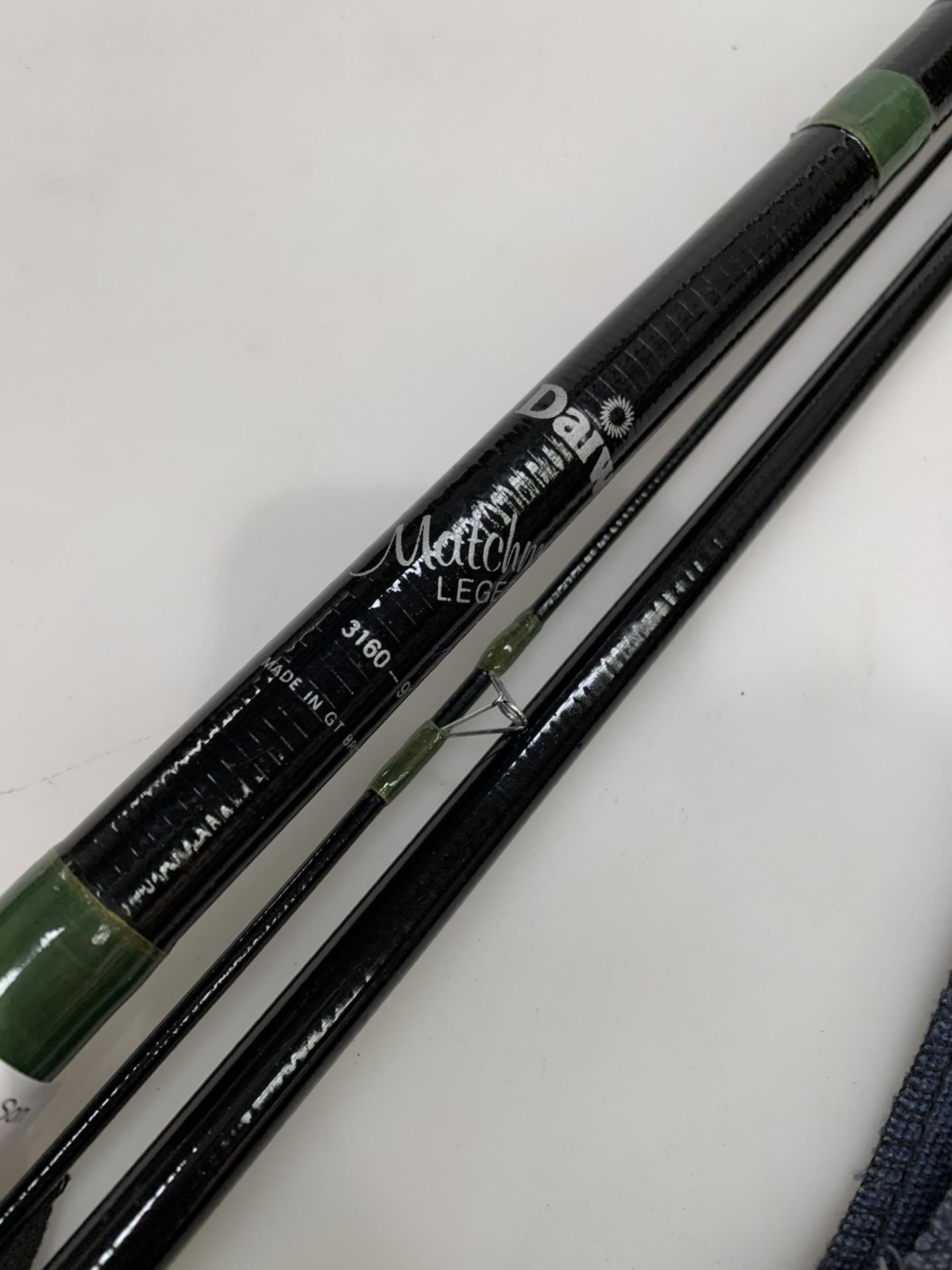 A Daiwa Matchman Leger 3160 9' three-piece fishing rod complete with bag