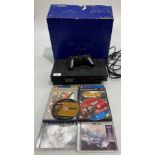 A Sony PlayStation 2 - one controller, three PS2 games (one unboxed,