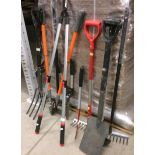 Quantity assorted garden tools - rakes, spade, fork, loppers,