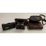 A pair of Le Jockey Club Paris binoculars (dismantled) in case, a Kershaw Eight.