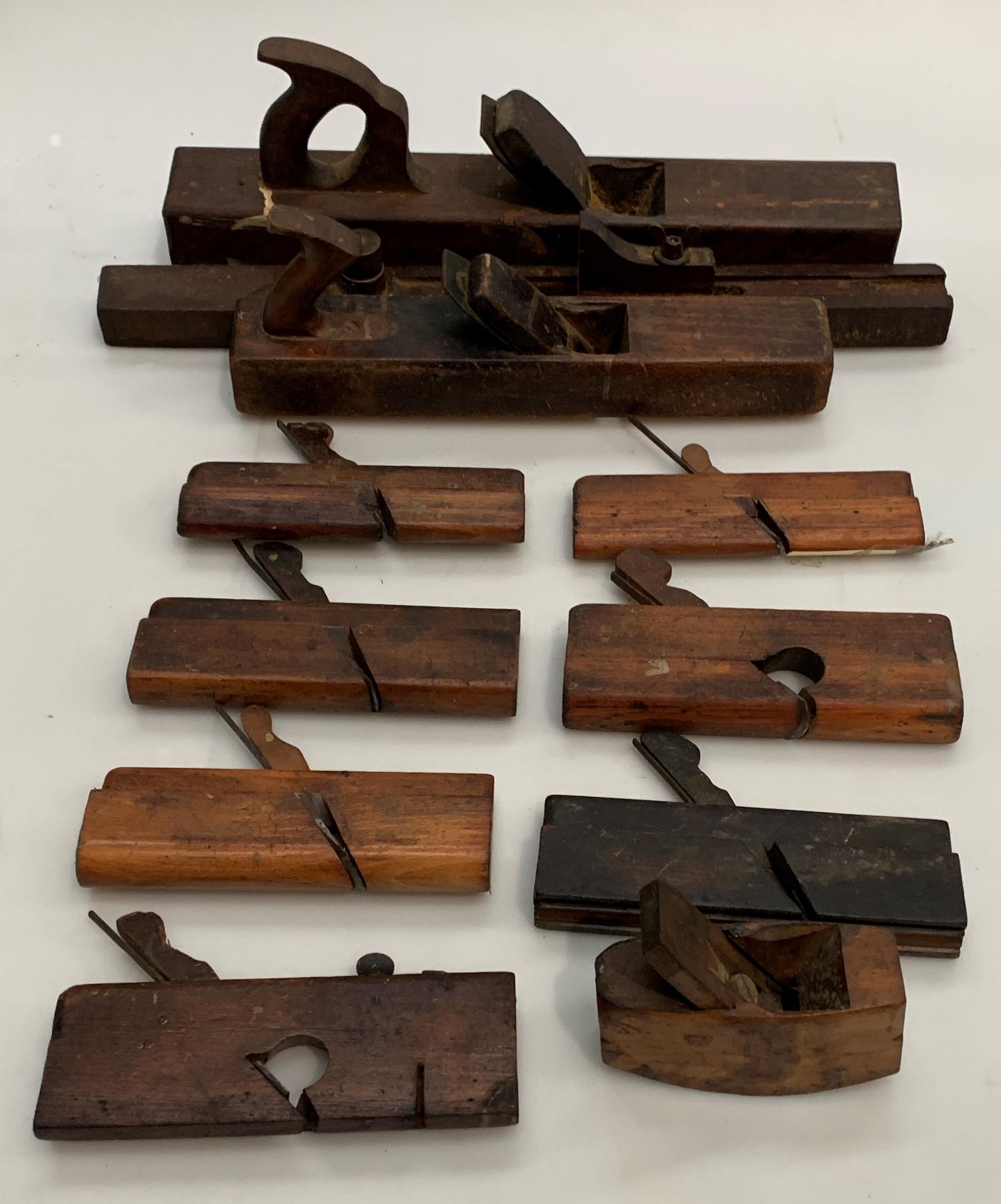 Eleven various wood block and rebate planes, one stamped A Mathison & Son,