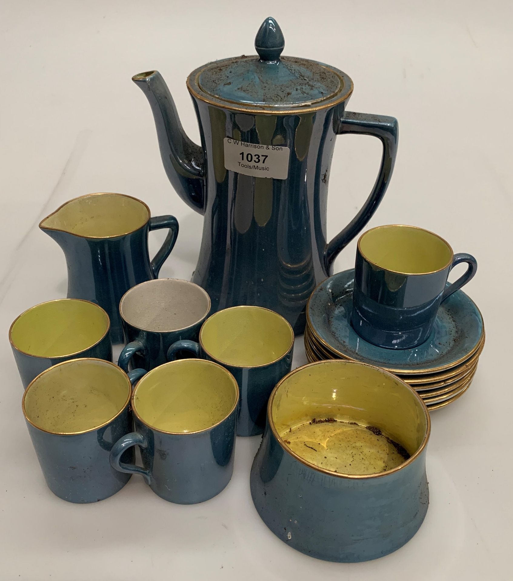 A Carlton blue glazed porcelain fifteen piece coffee set (one cup white glazed internally)