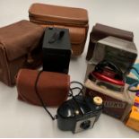 Contents to drawer - a Houghton Butcher JB Ensign box camera in bag, another box camera,