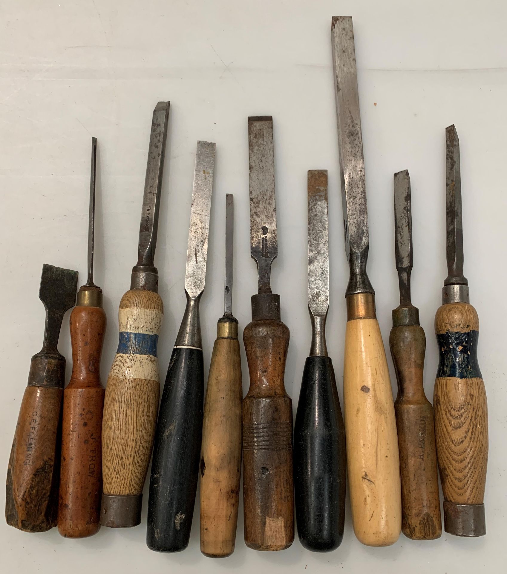 Ten various wooden handled chisels