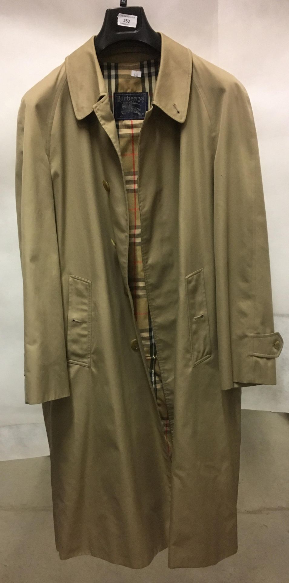 A stone Burberry long trench coat (worn)