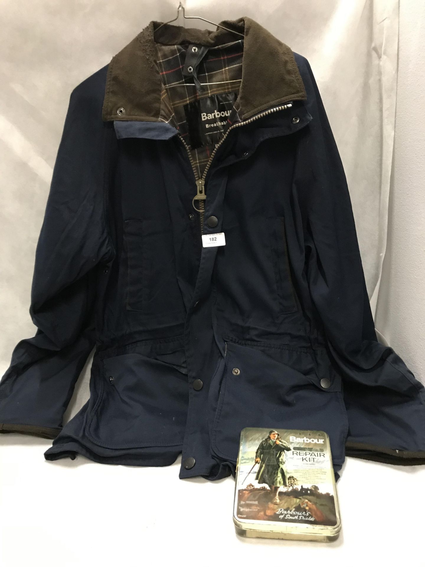 A Barbour breathable short coat in blue size M (used but reasonable condition),