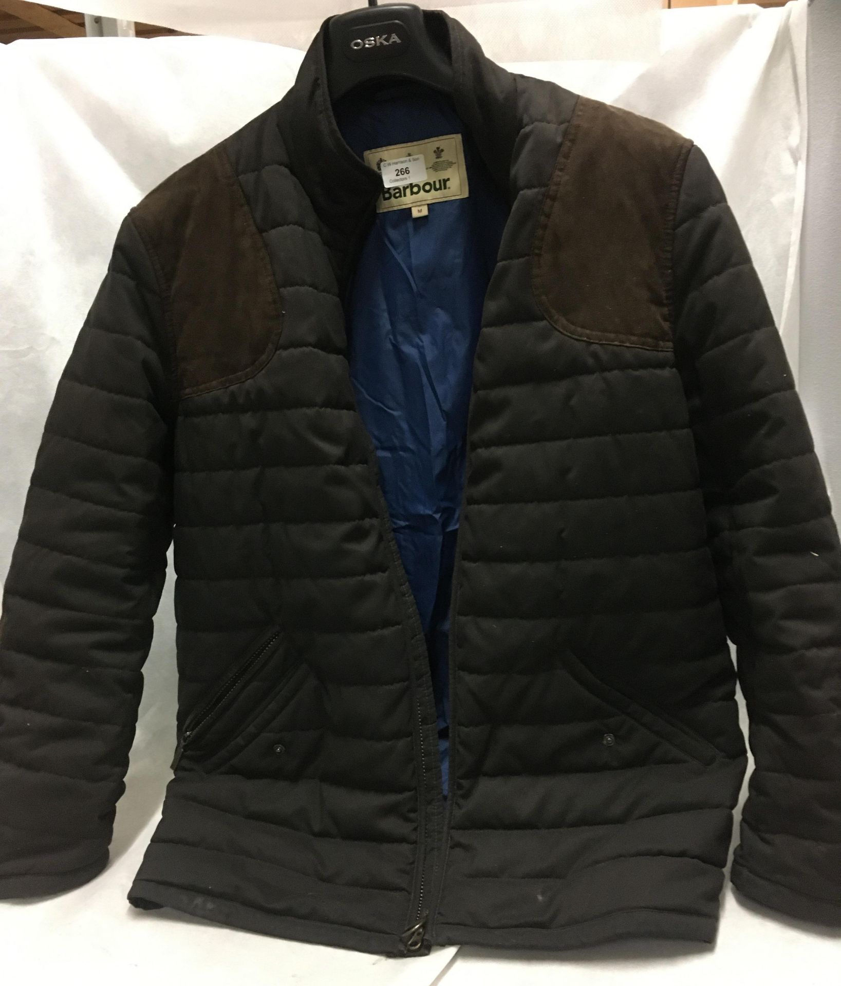 A brown padded Barbour coat (size M)