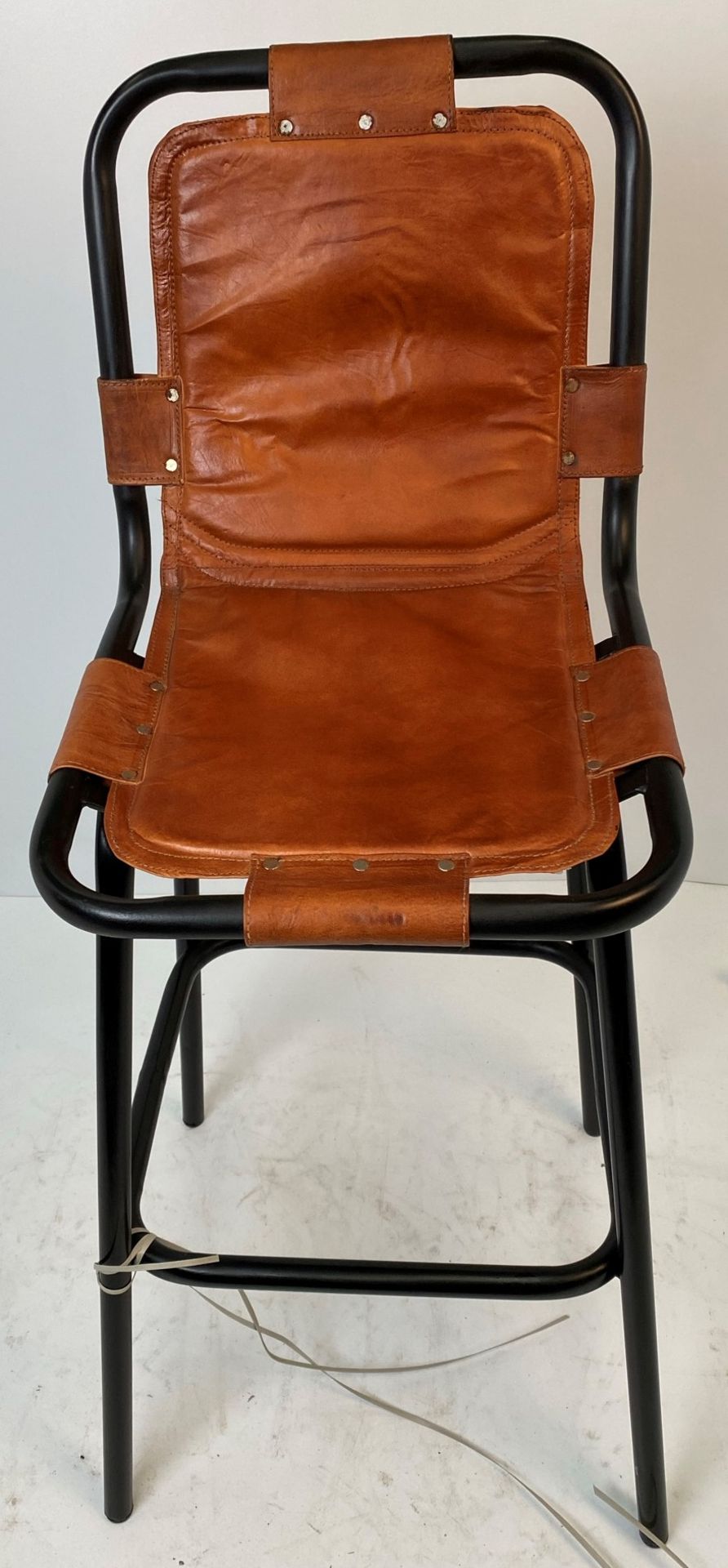2 x Industrial Saddle chairs with black metal frame and brown leather effect seat
