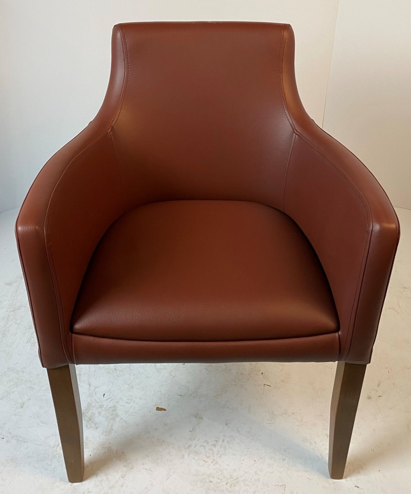 A Nina Vena BR-3 Chocolate armchair with B.