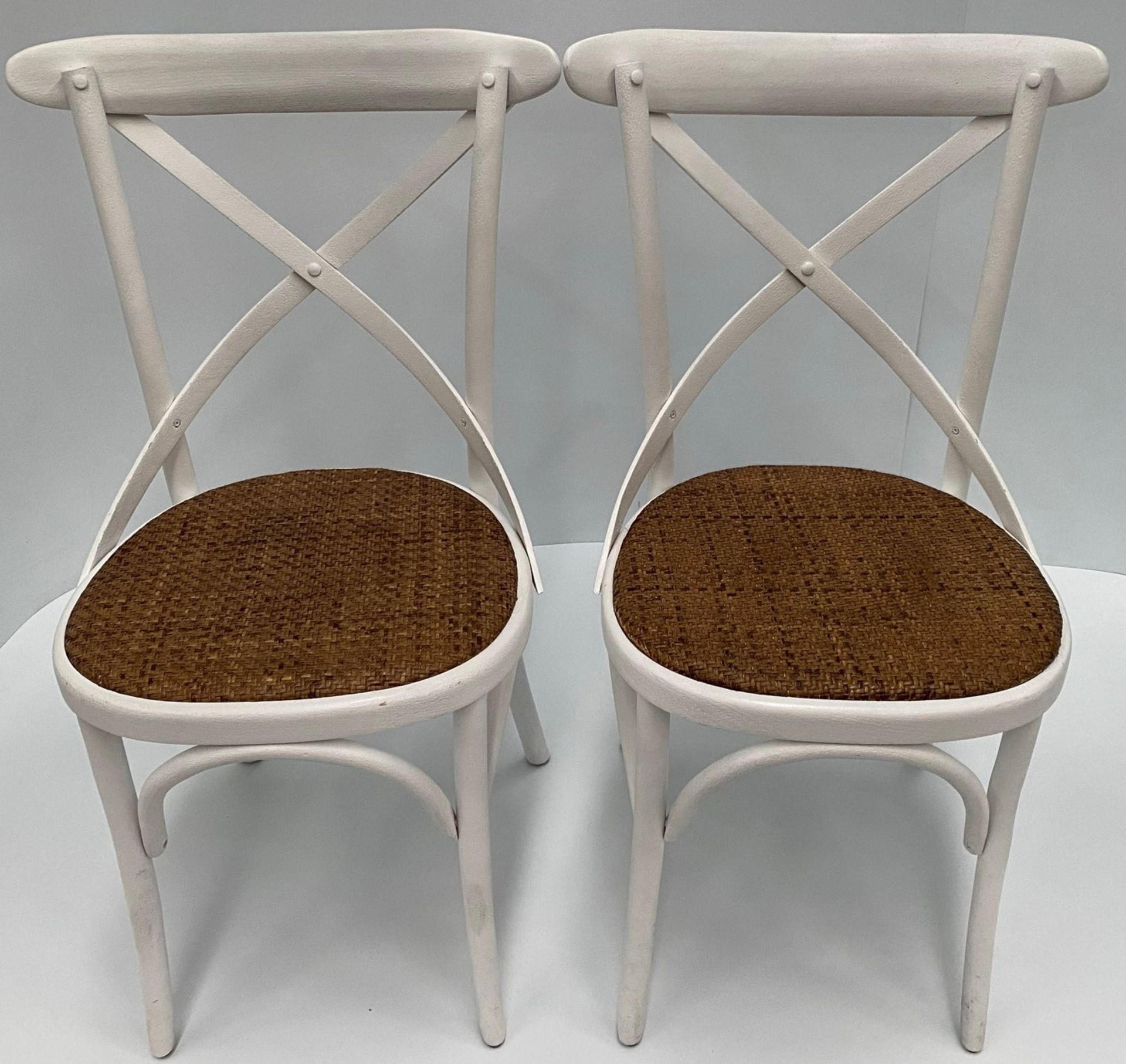 2 x White Palm chairs with hessian seats.