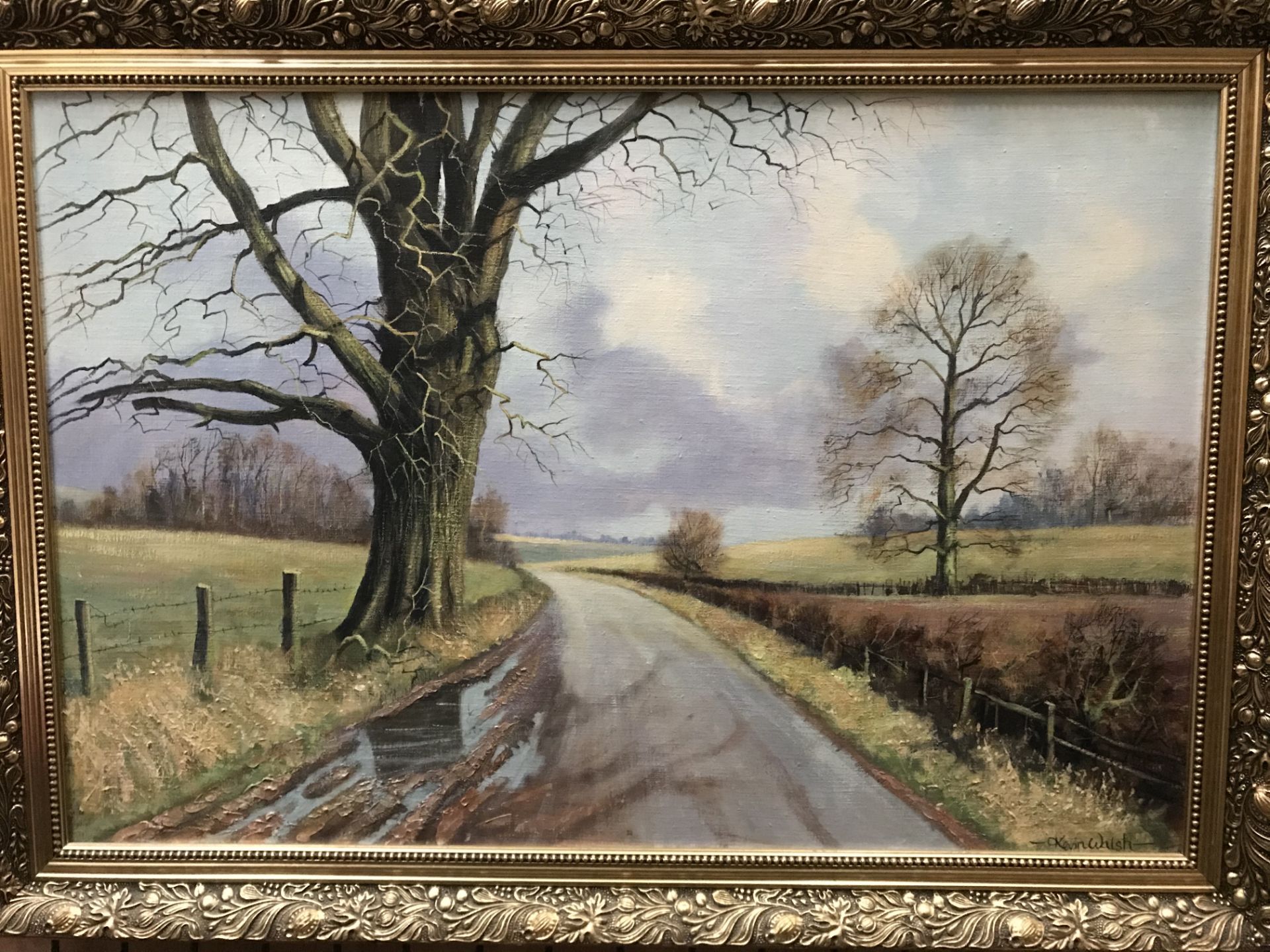 Kevin Walsh, gilt framed oil on canvas 'Country Road in Winter', signed to bottom right,