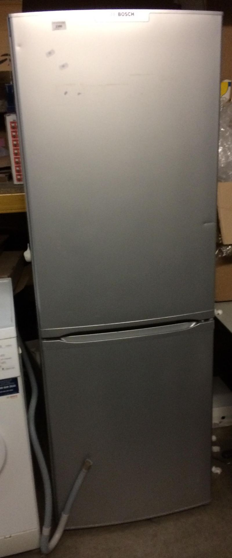 A Bosch Classixx electronic frost free upright fridge freezer (missing one shelf to fridge section)