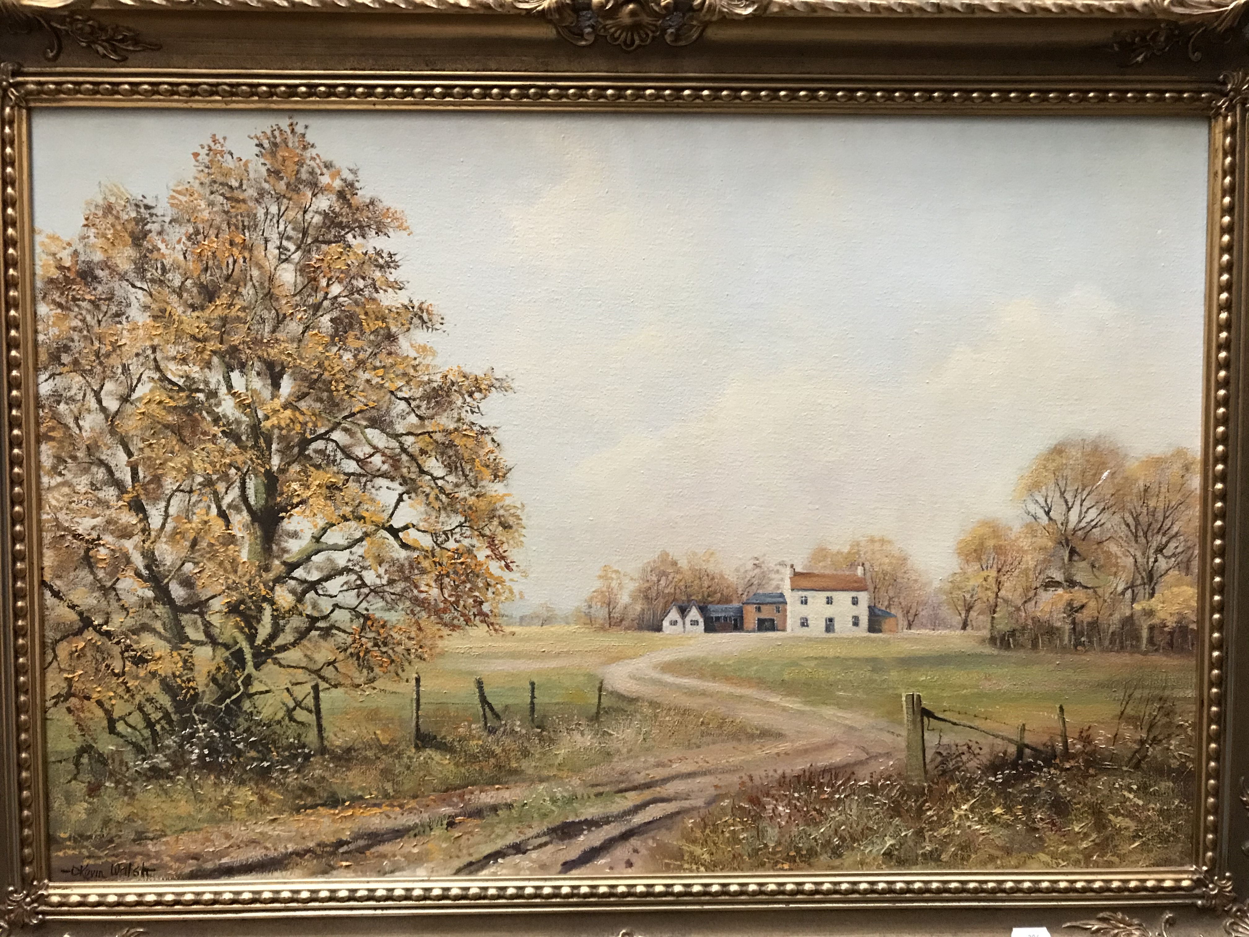 Kevin Walsh, gilt framed oil on canvas 'Dirt Track leading to Farm Buildings',