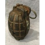 A deactivated hand grenade, stamped to b