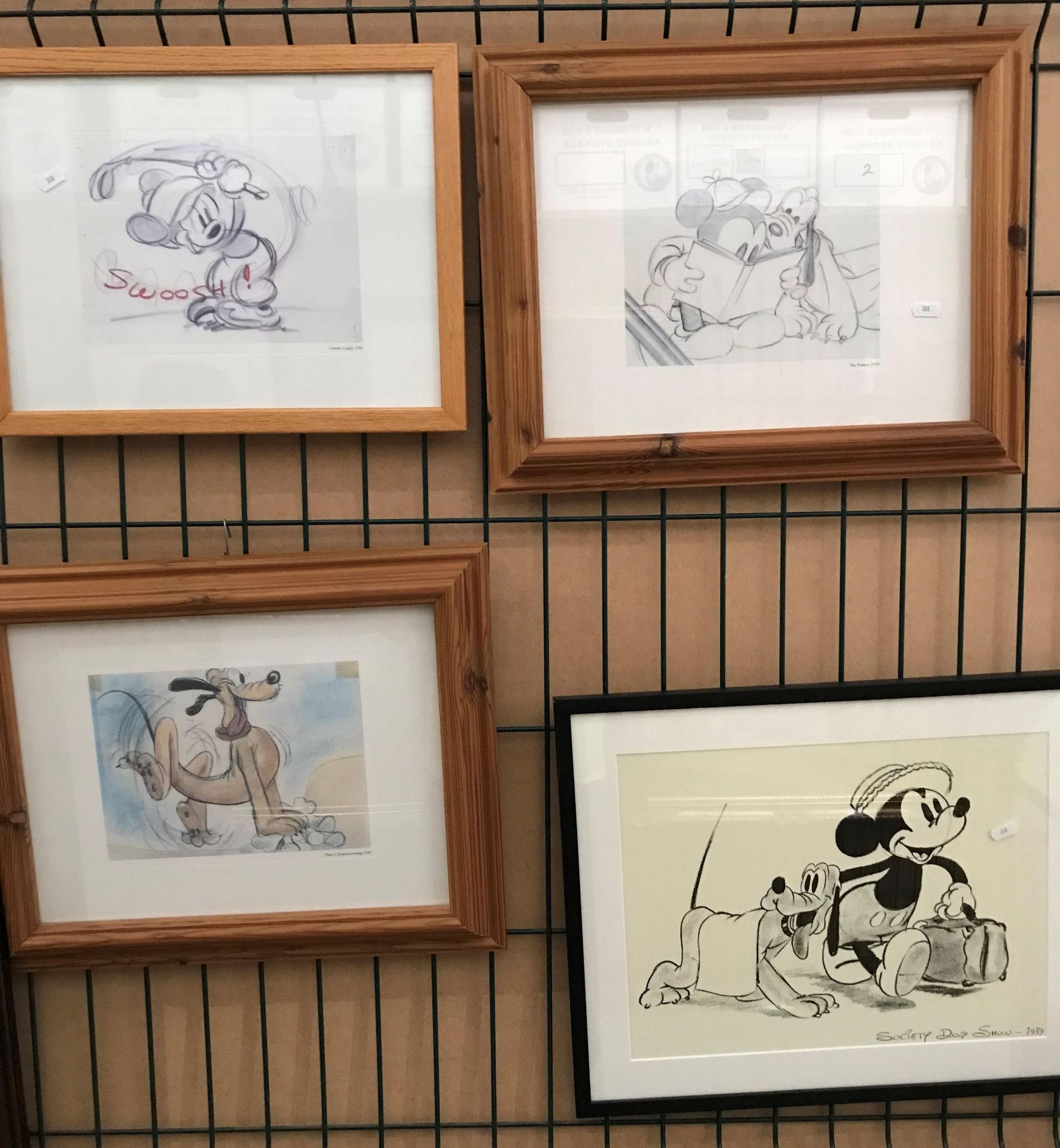 Four various framed Walt Disney prints,