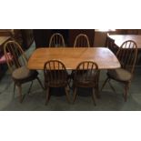 An Ercol blonde elm dining table, 150cm