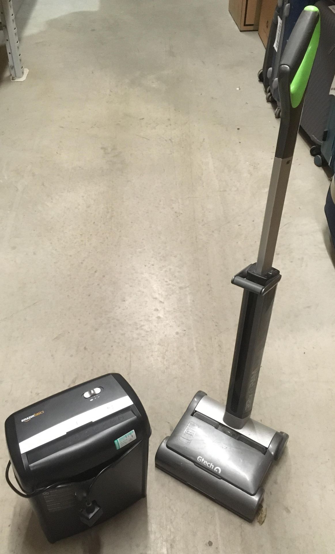 A Gtech 22v Air Ram cordless vacuum cleaner (no charger) and an Amazon Basics shredder (2)