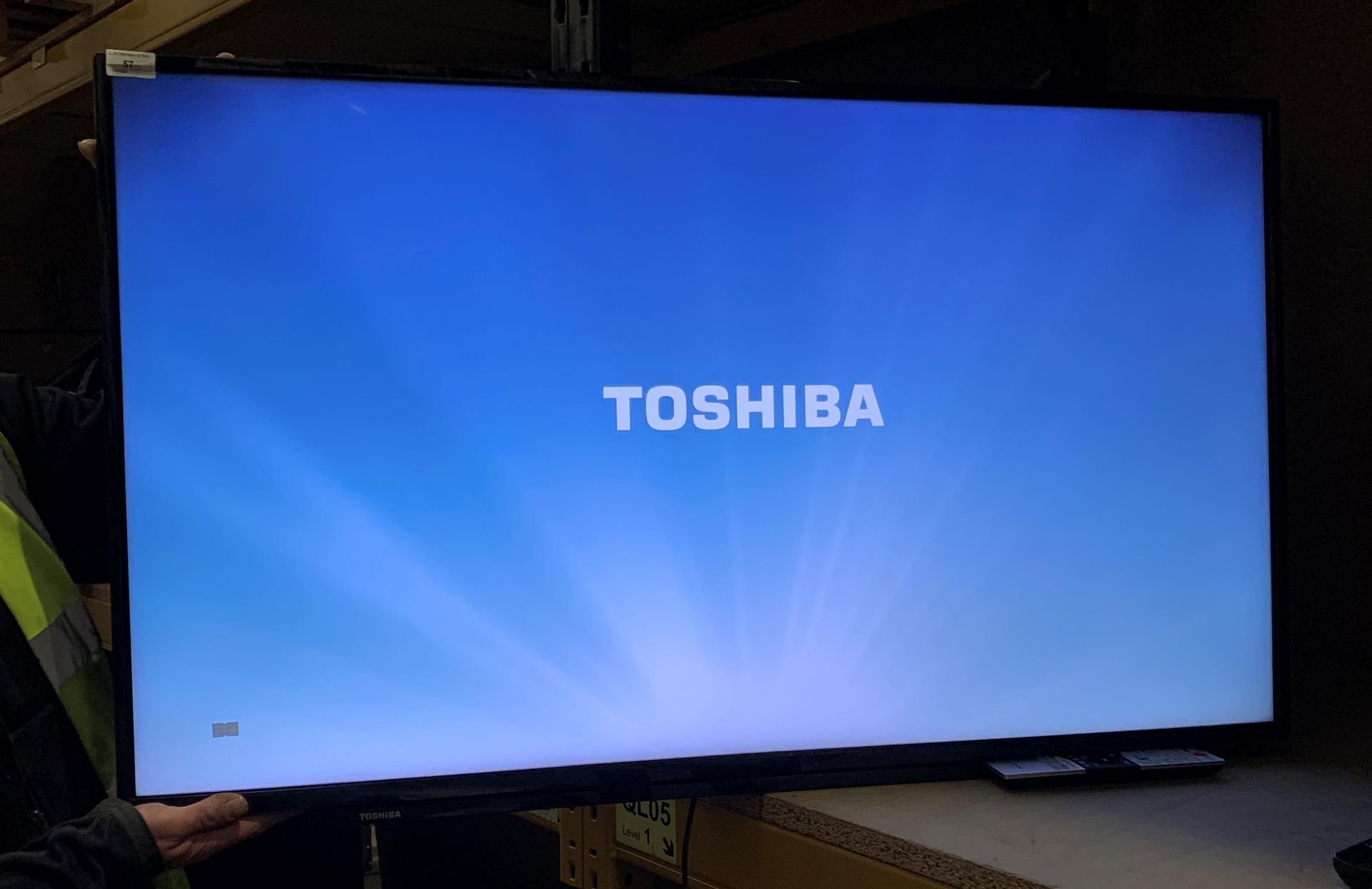 A Toshiba 4942963DB 49" LCD colour TV - complete with remote control - no stand