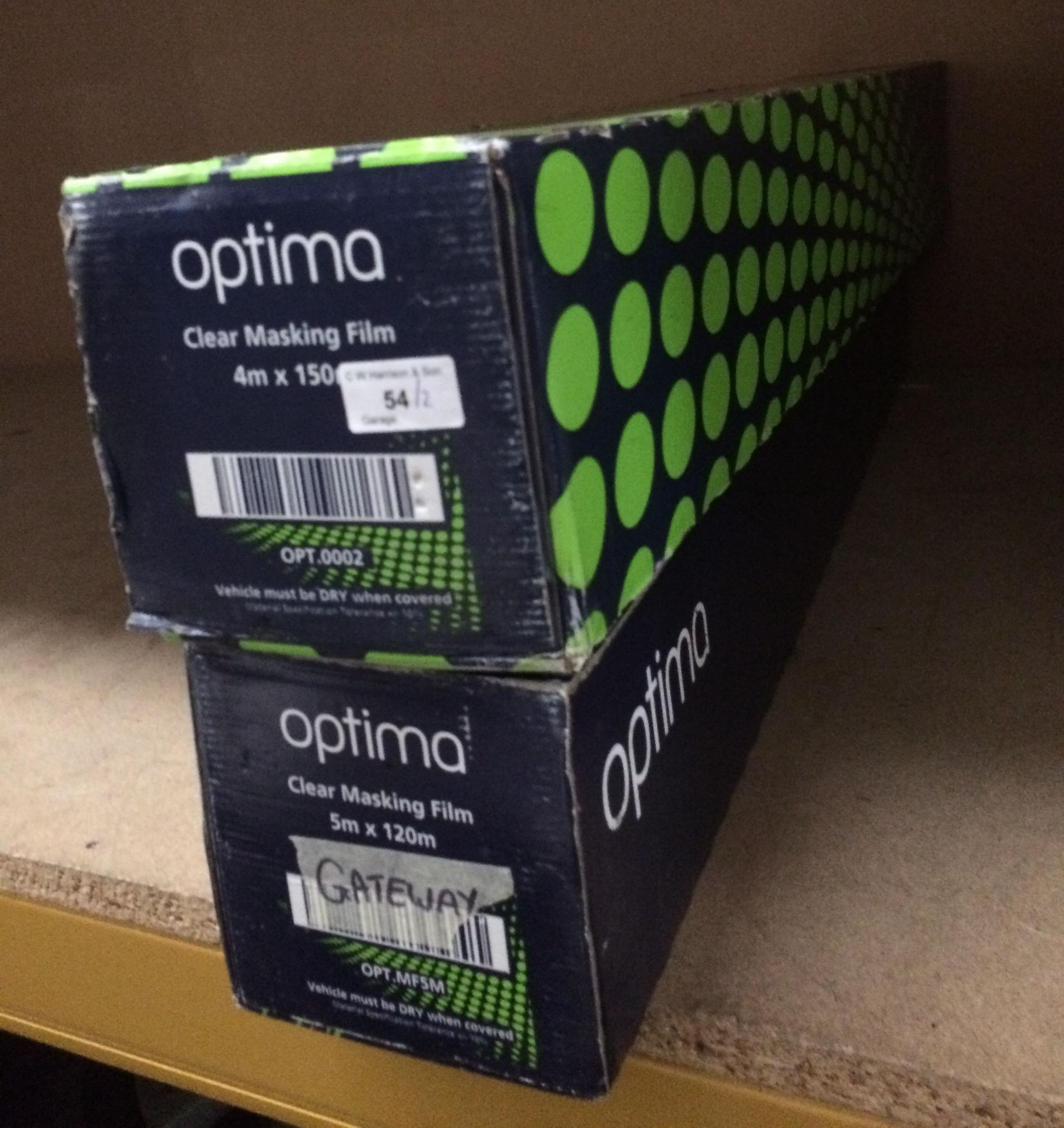 Two rolls of Optima clear masking film - one 4m x 150m and one 5m x 120m