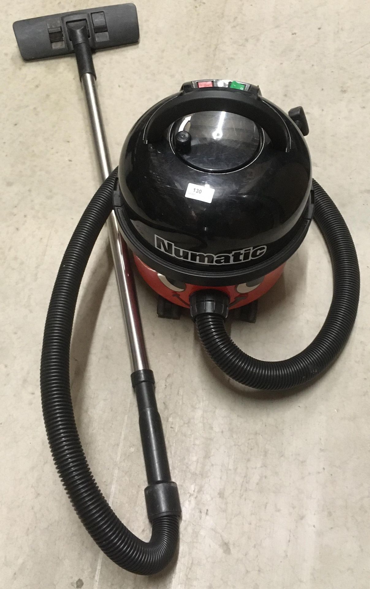 A Numatic Henry tub vacuum cleaner complete with hose (motor faulty,