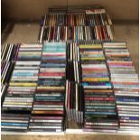 Contents to three white lids - approximately 300 assorted CDs and CD box sets featuring music from