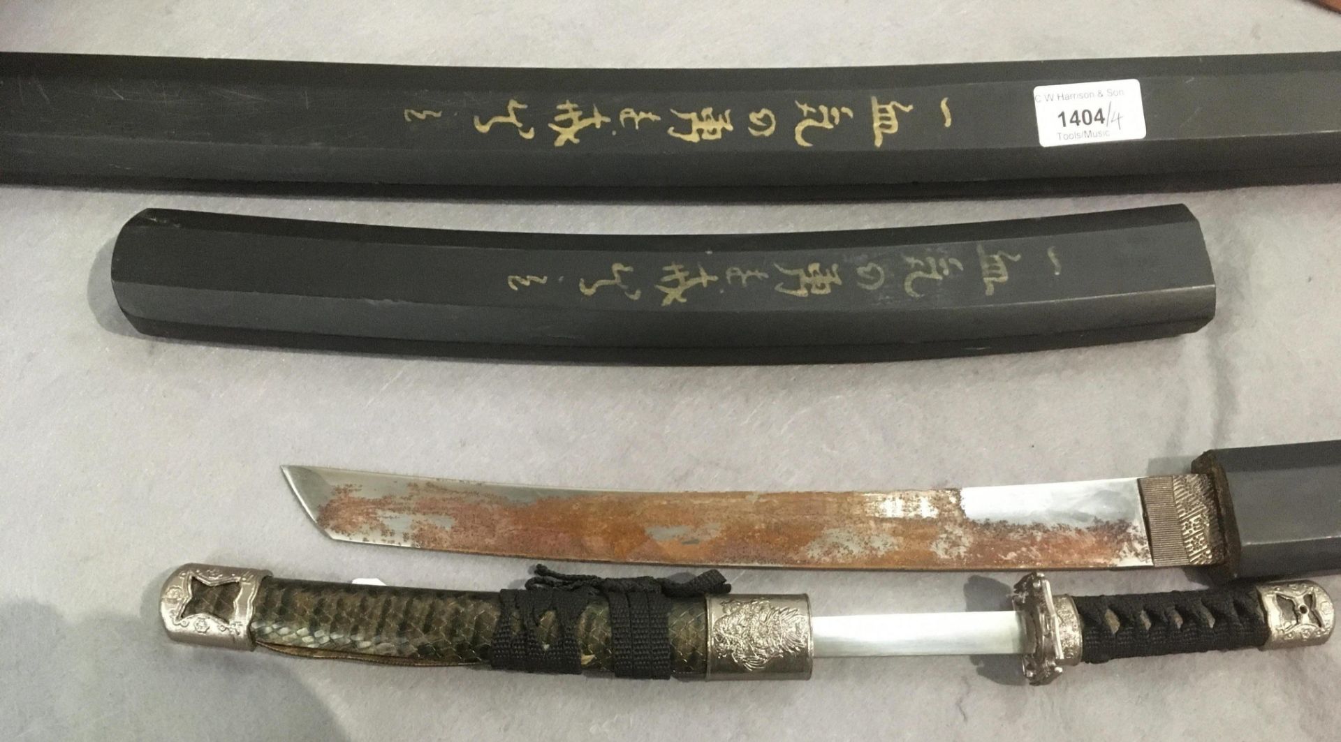 A reproduction Japanese sword in sheath, blade length 67cm, and a matching shorter sword, - Image 2 of 2