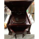 A His Masters Voice table top gramophone in mahogany case complete with winding handle