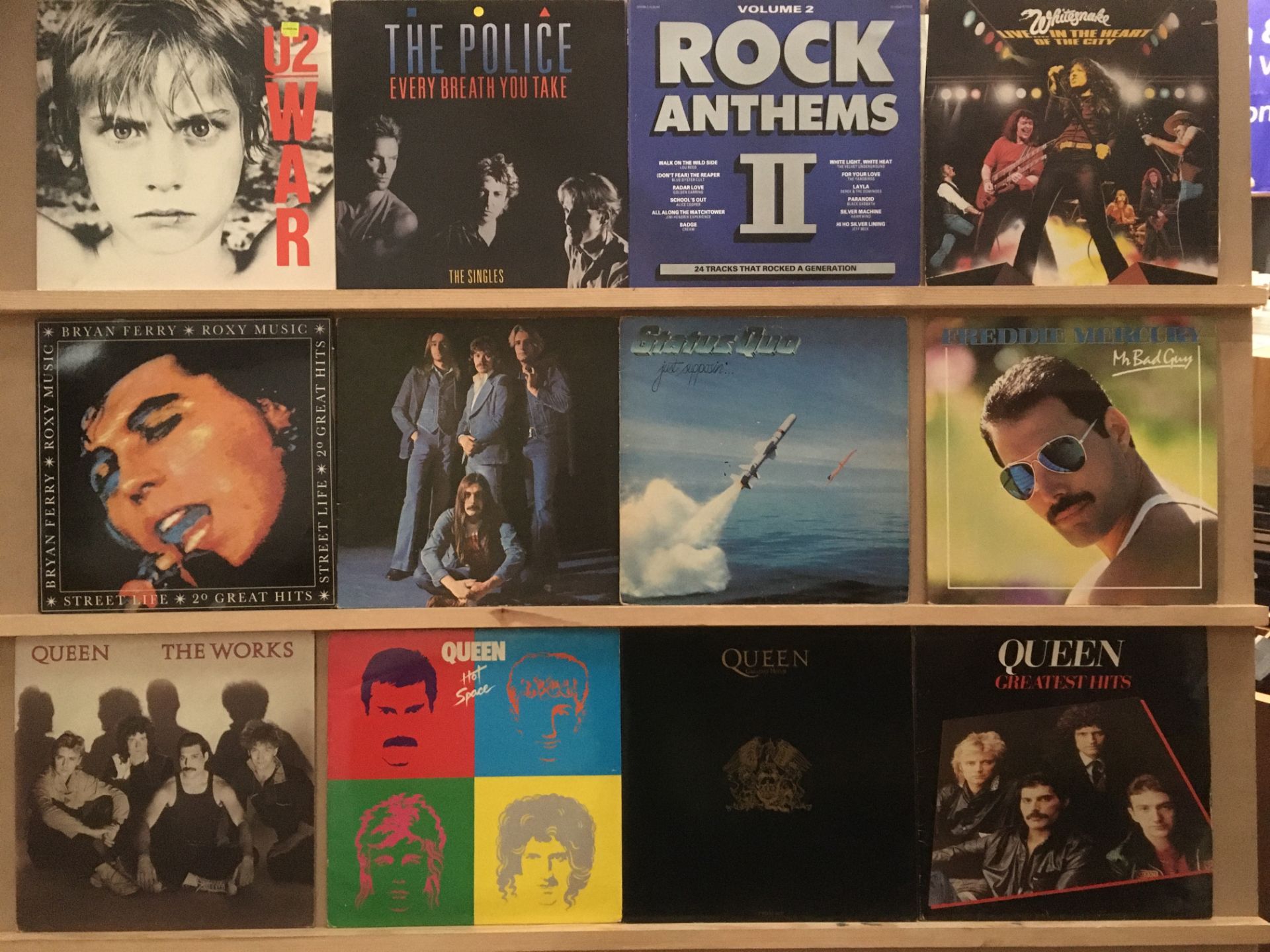 12 LPs - Queen (4), Freddie Mercury, Status Quo (2), The Police, U2, Bryan Ferry and Roxy Music,