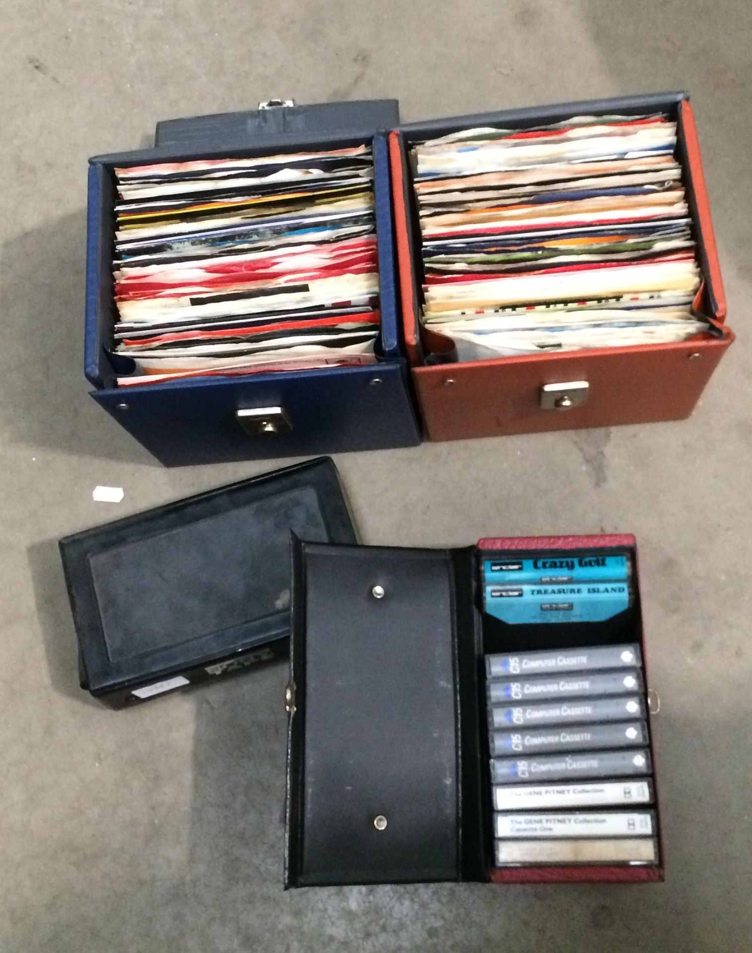 Contents to brown and blue vinyl singles cases - approximately 145 assorted 45rpm singles including