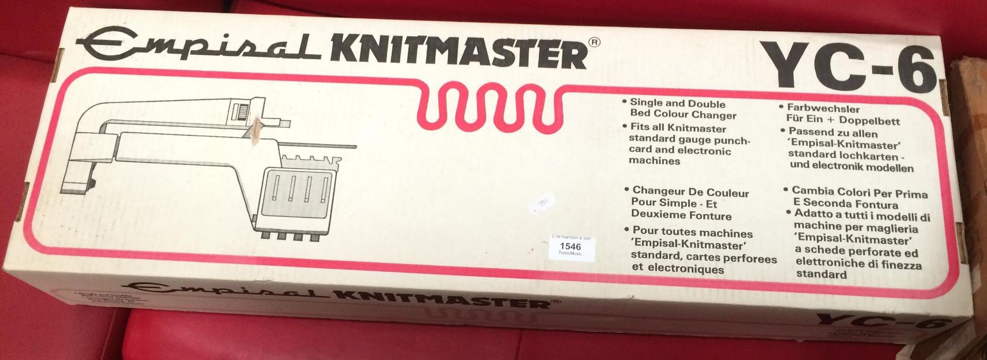 An Empisal Knitmaster YC-6 single and double bed colour changer knitting machine - boxed