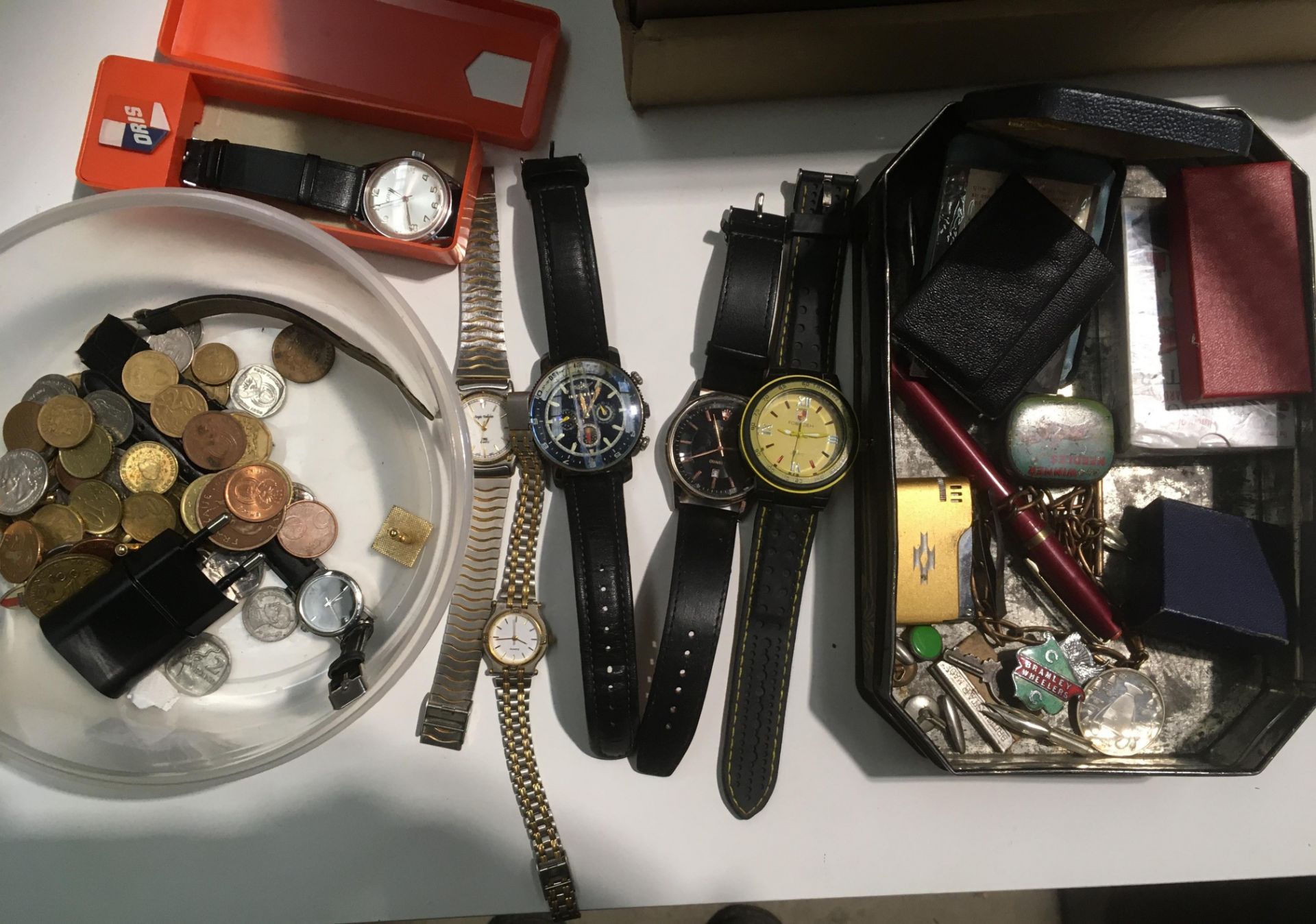 A tub containing various watches - Oris, a copy Rolex quartz, a Breitling copy,