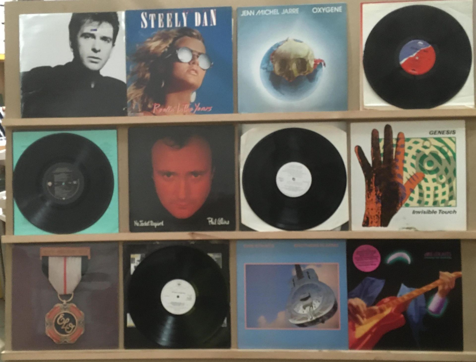 12 LPs - Jean Michel Jarre (2), Dire Straits (2), Phil Collins (2), Fleetwood Mac, Genesis,