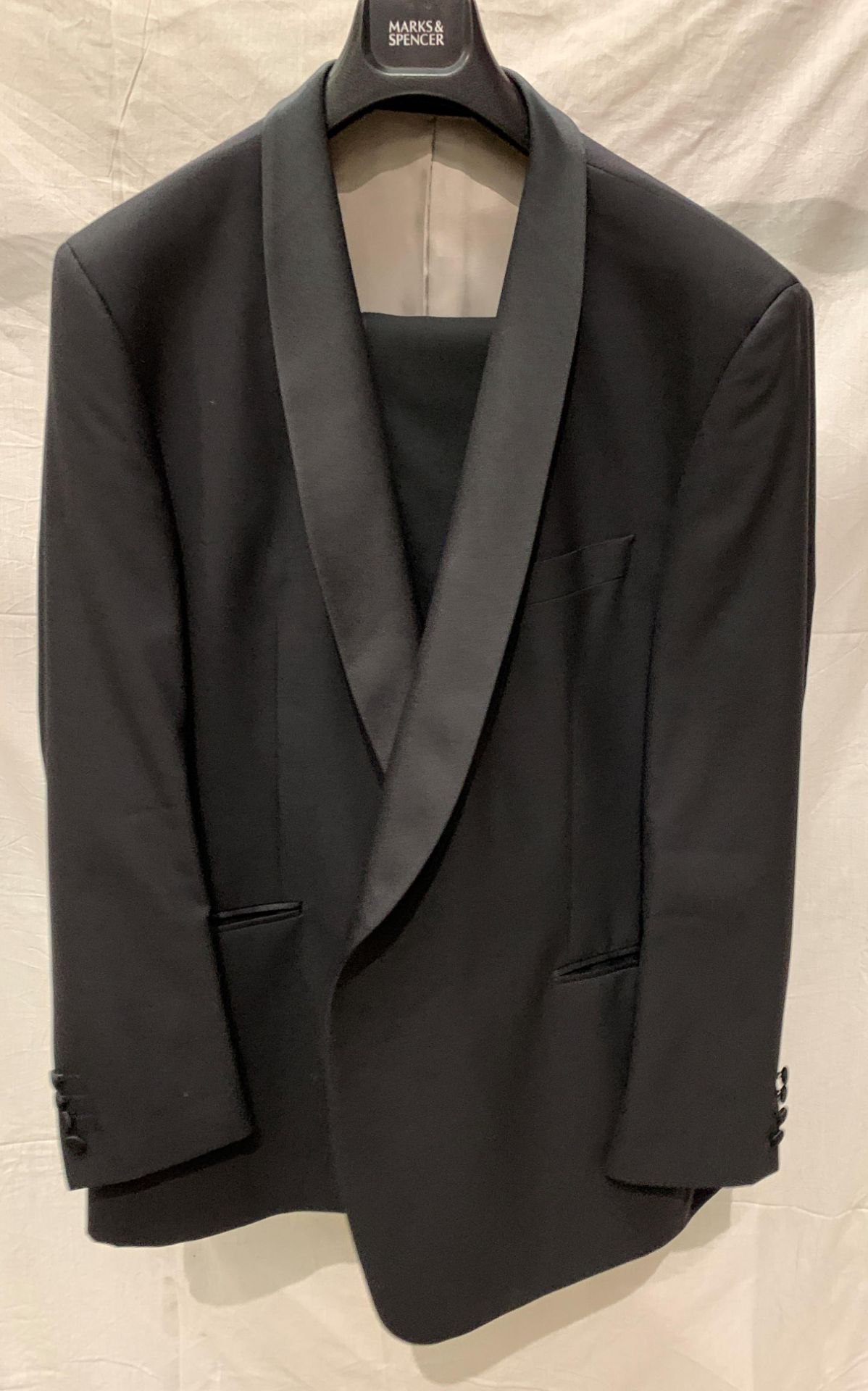 From a deceased estate - a M&S black two piece dinner suit, jacket size 50,