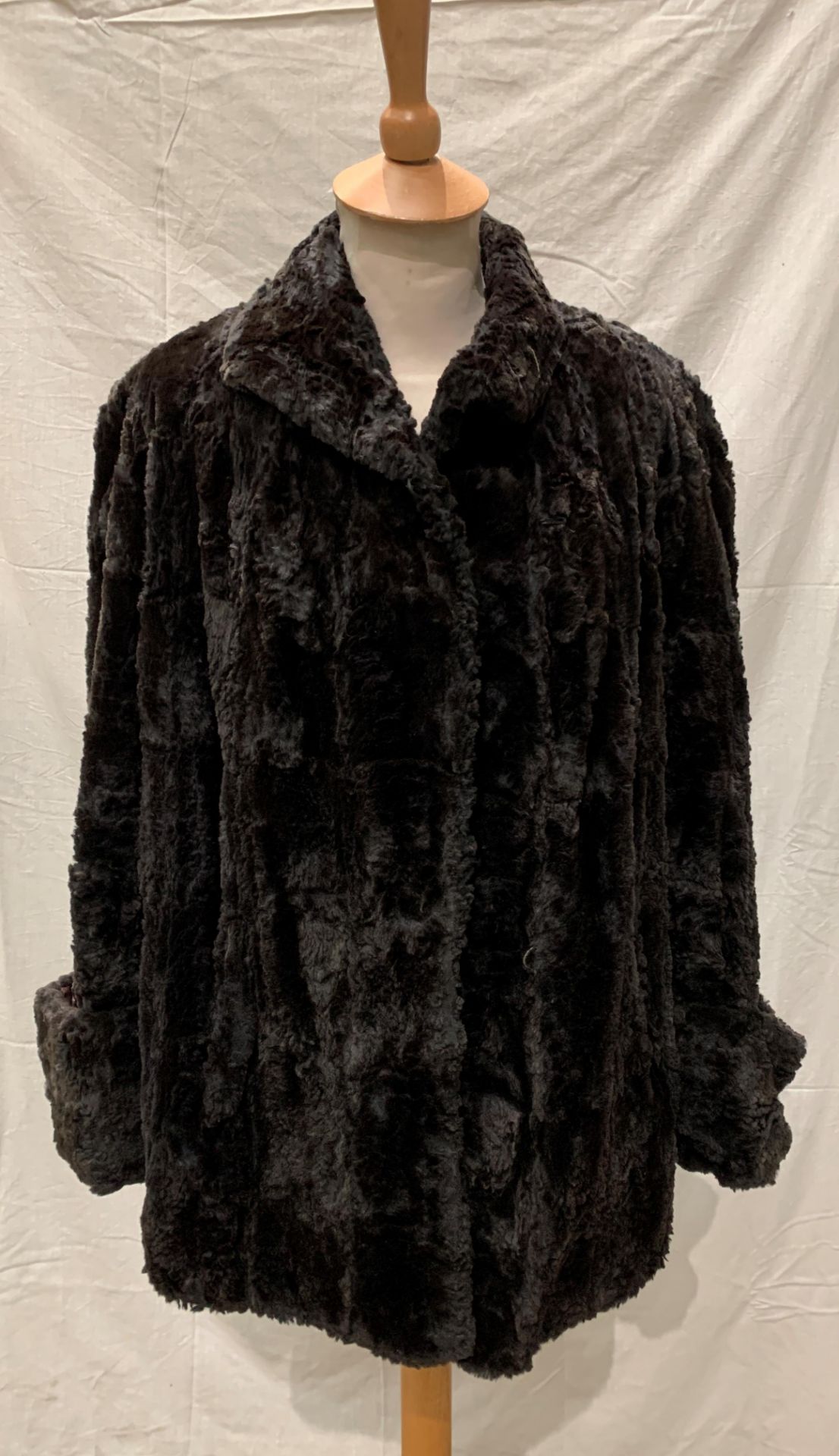 From a deceased estate - a lady's black short fur jacket,