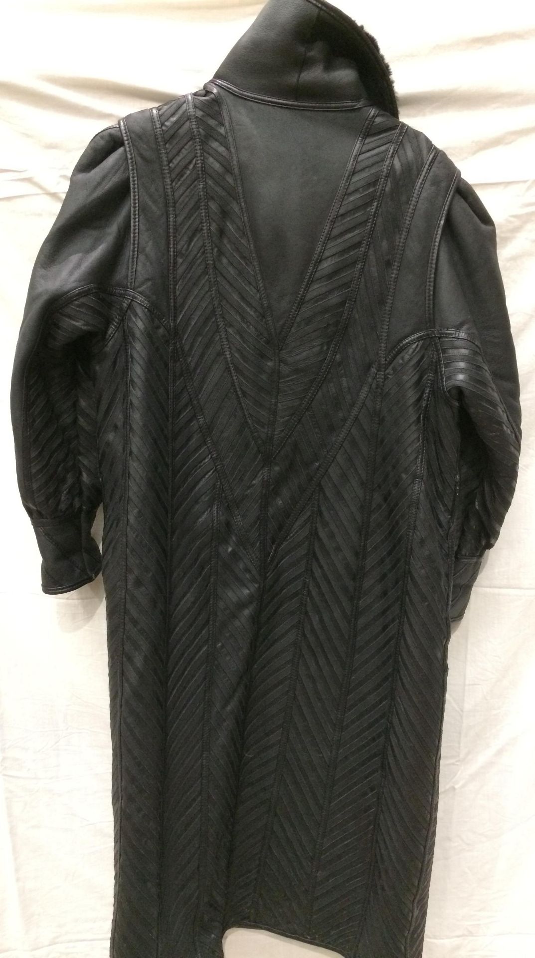 A designer lady's black leather chevron finish long trench coat (lined), no size shown, - Image 2 of 2