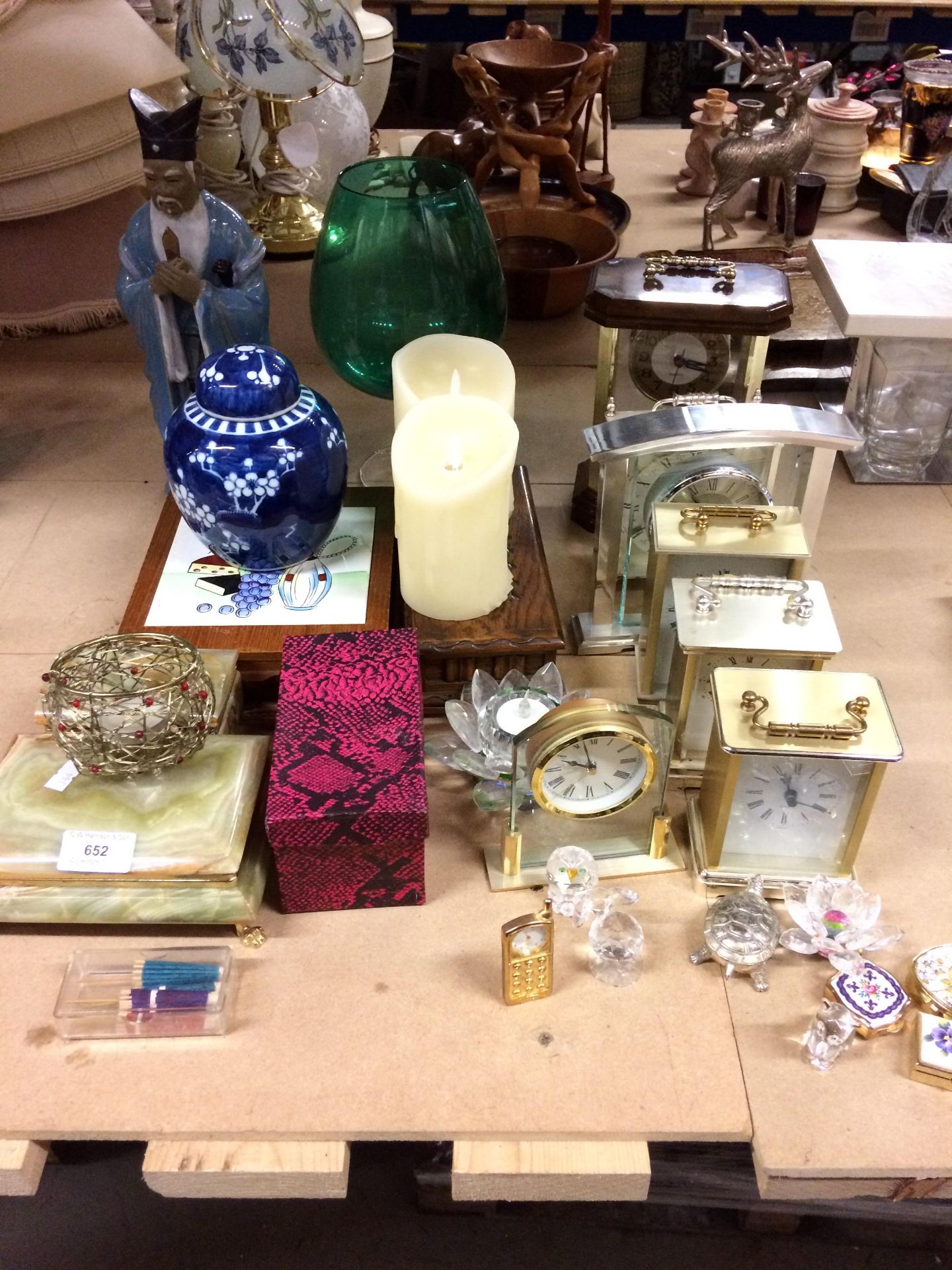 Contents to part of rack - seven assorted clocks, wine and cheese case, wooden cigarette box, etc.