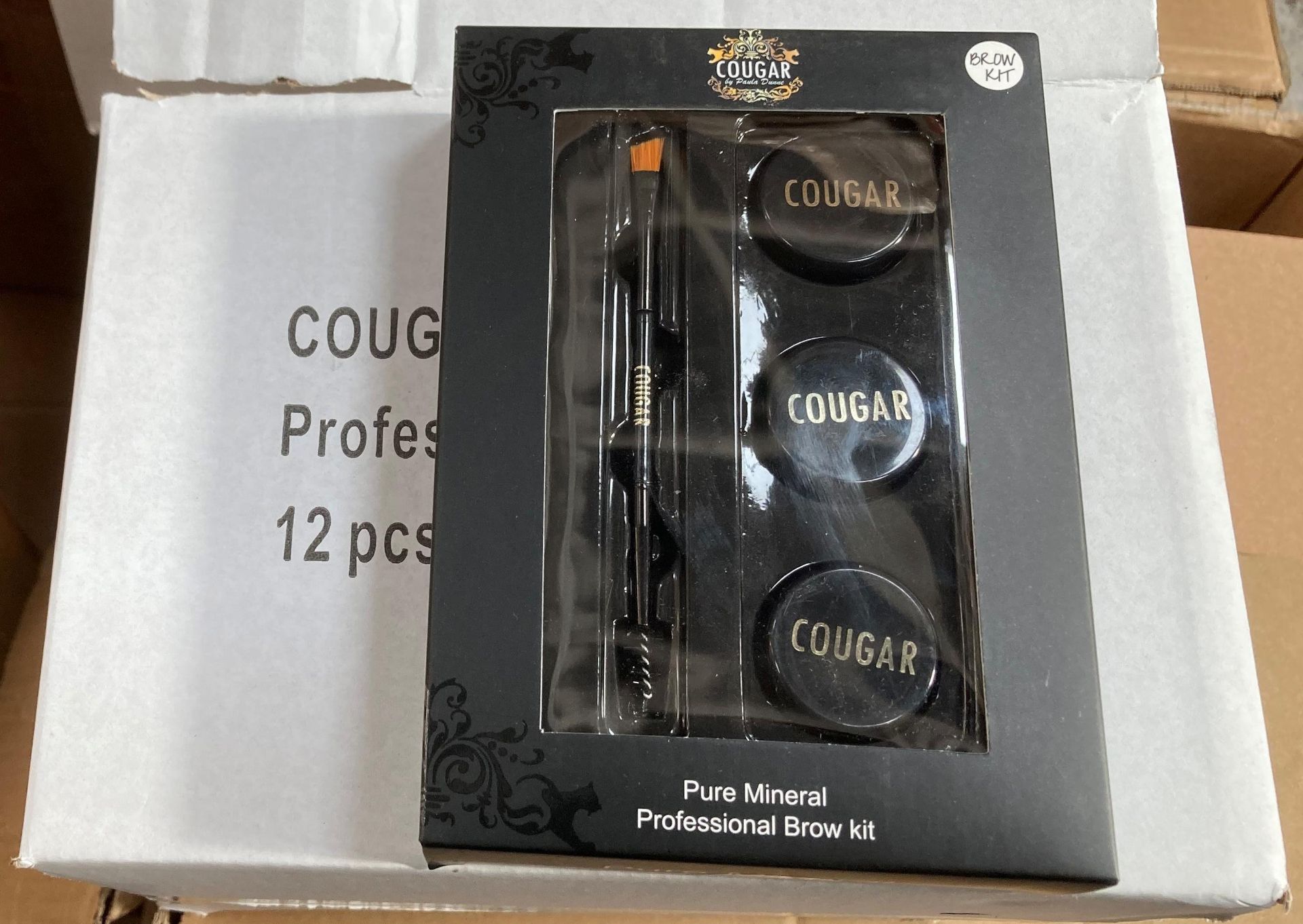 Two boxes of Cougar Pure Mineral Professional Brow Kits (12 units per box)