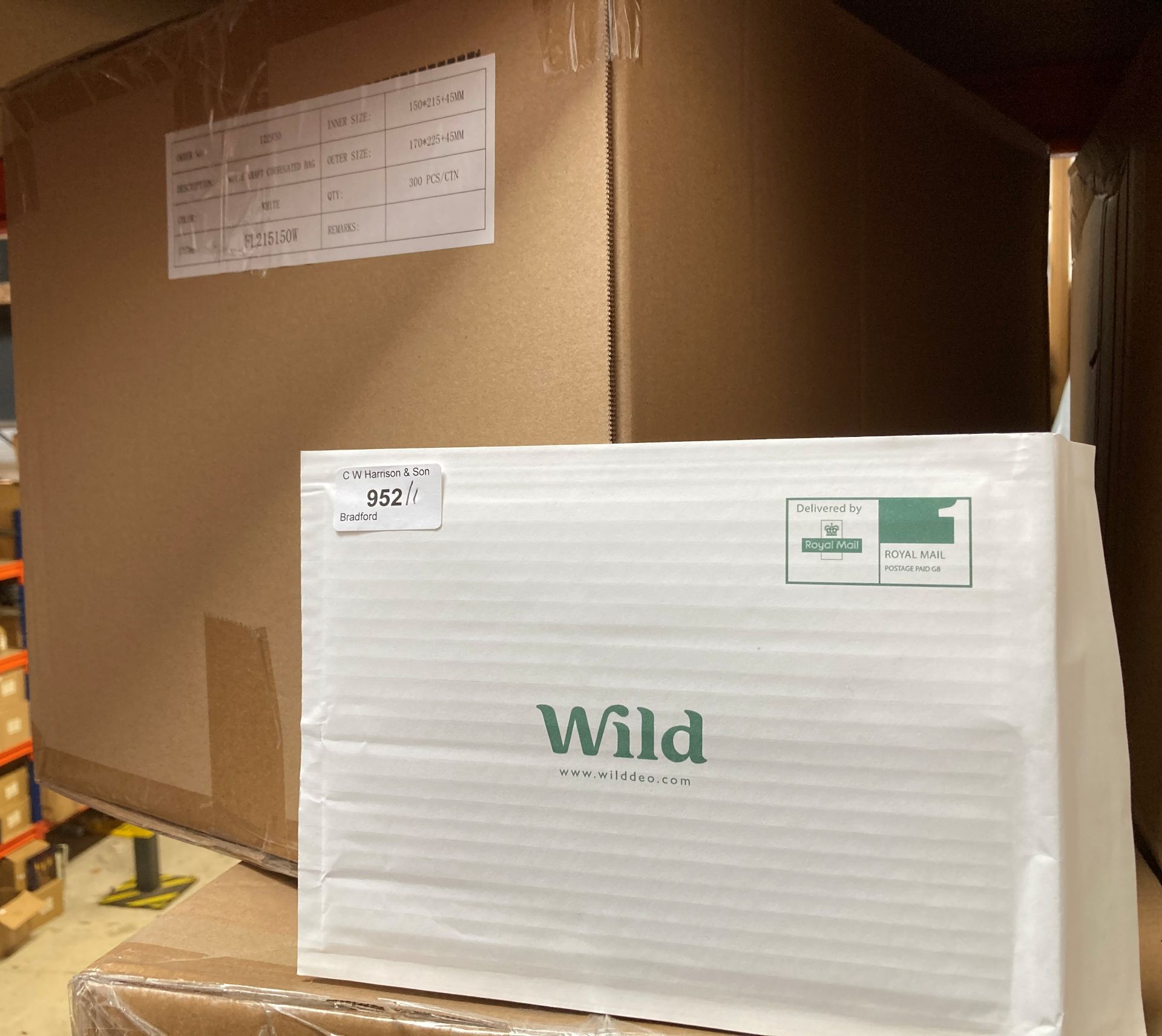 One box of white Kraft corrugated postal bags (300 units per bag)
