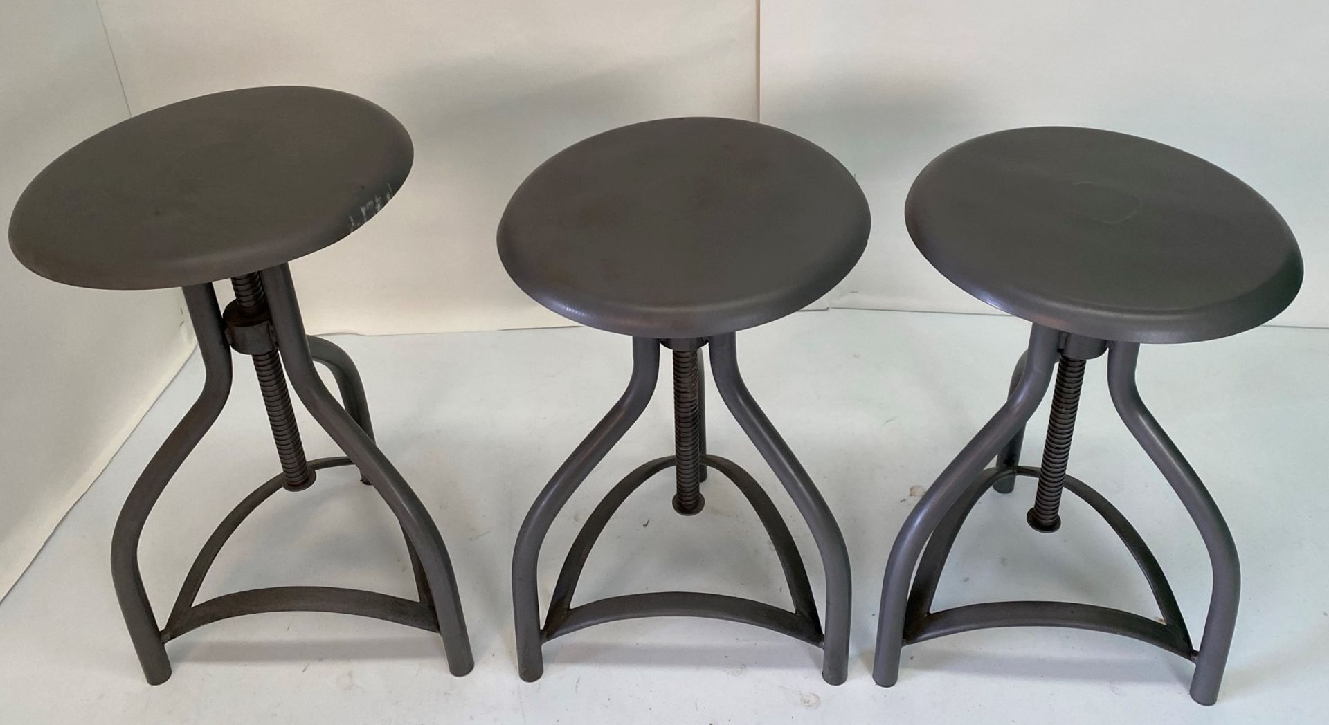 3 x Industrial swivel low stool with metal seat - One seat has a dent/scruff on the side