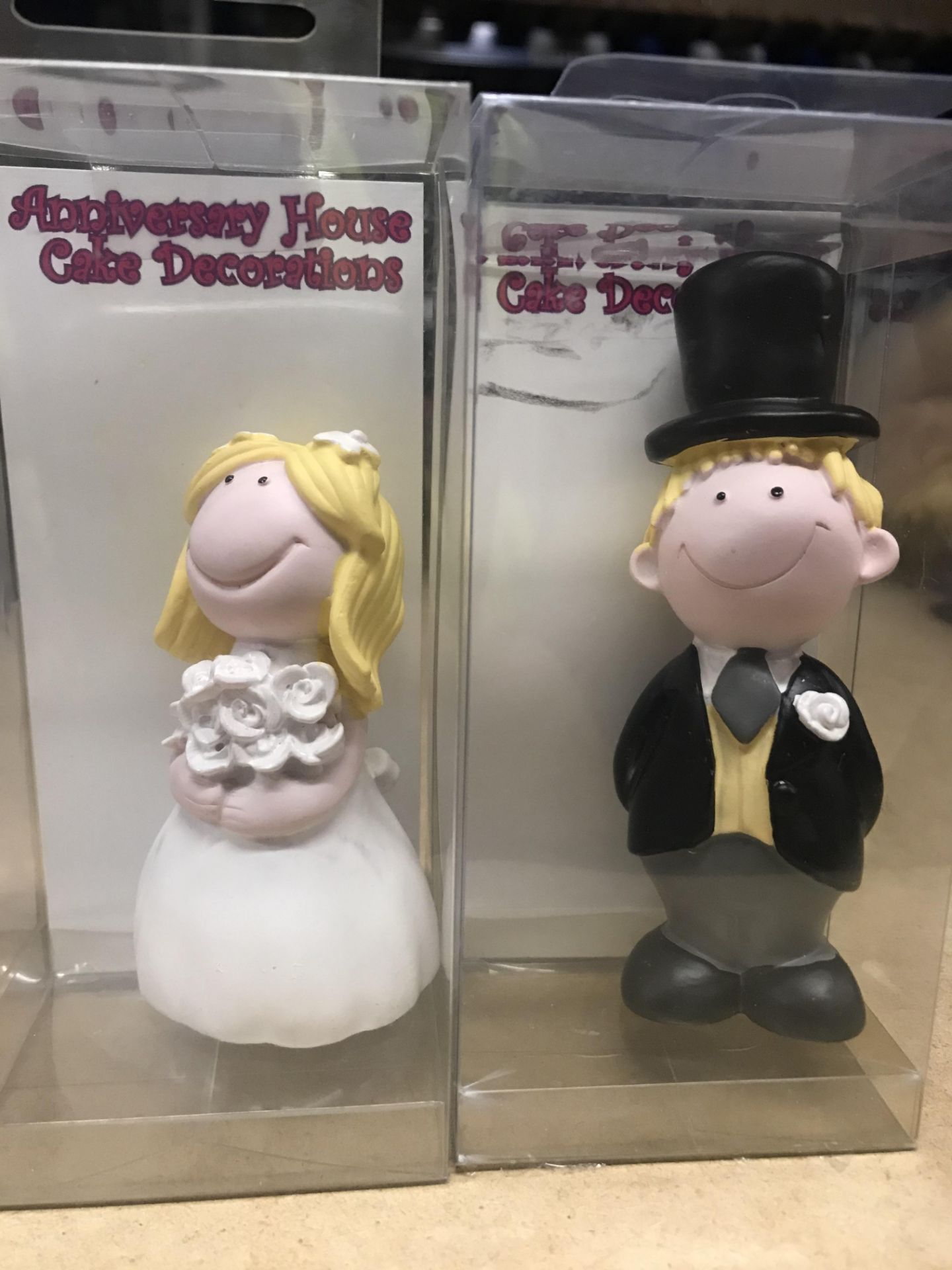 38 x Cutie Bride and Groom blonde cake decorations by Anniversary House (please note - blue crate