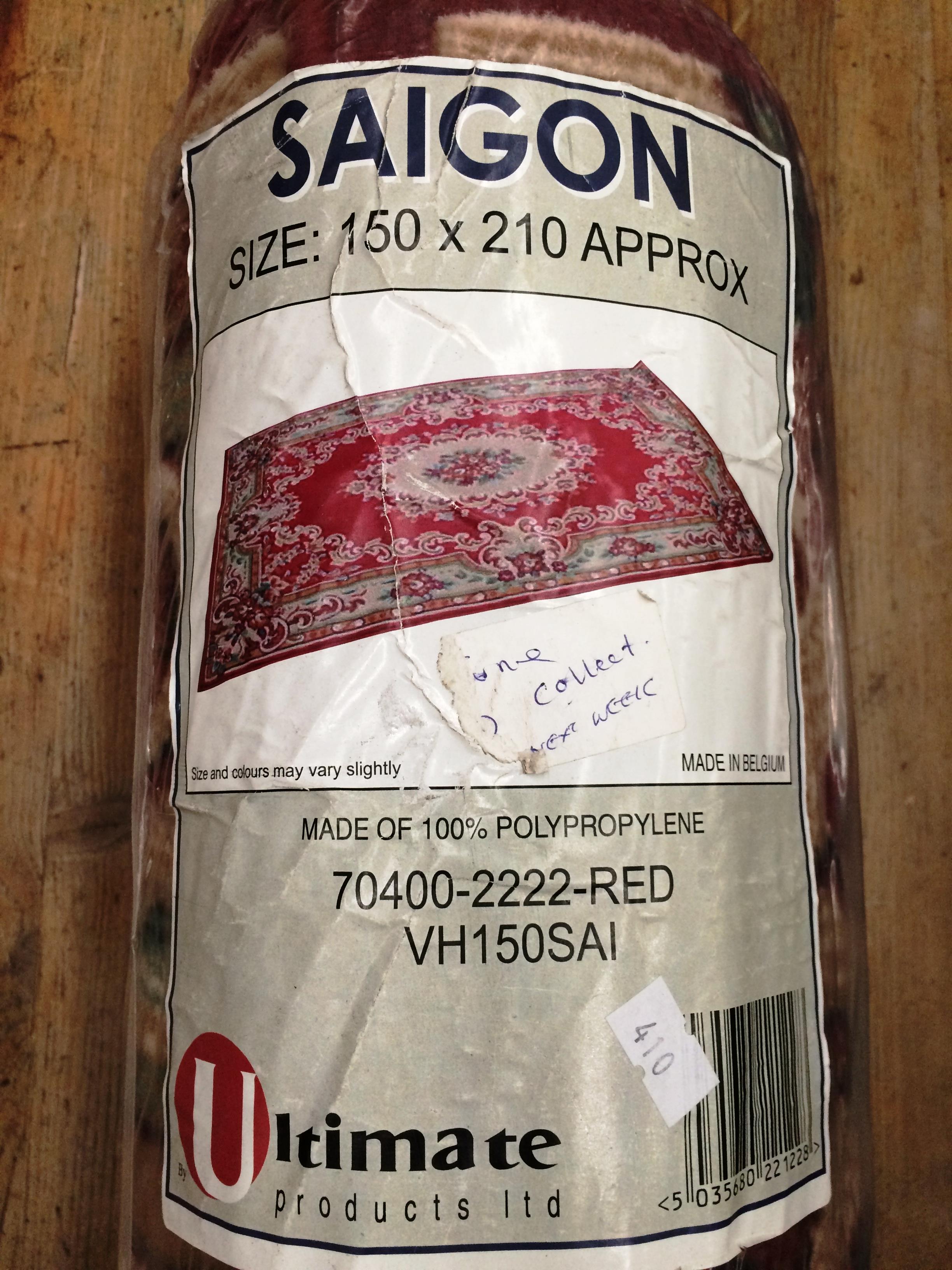 An Ultimate Products Saigon red patterned rug 100% polypropylene 150 x 210cm (still packaged)