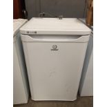 An Indesit A+ Class under counter fridge