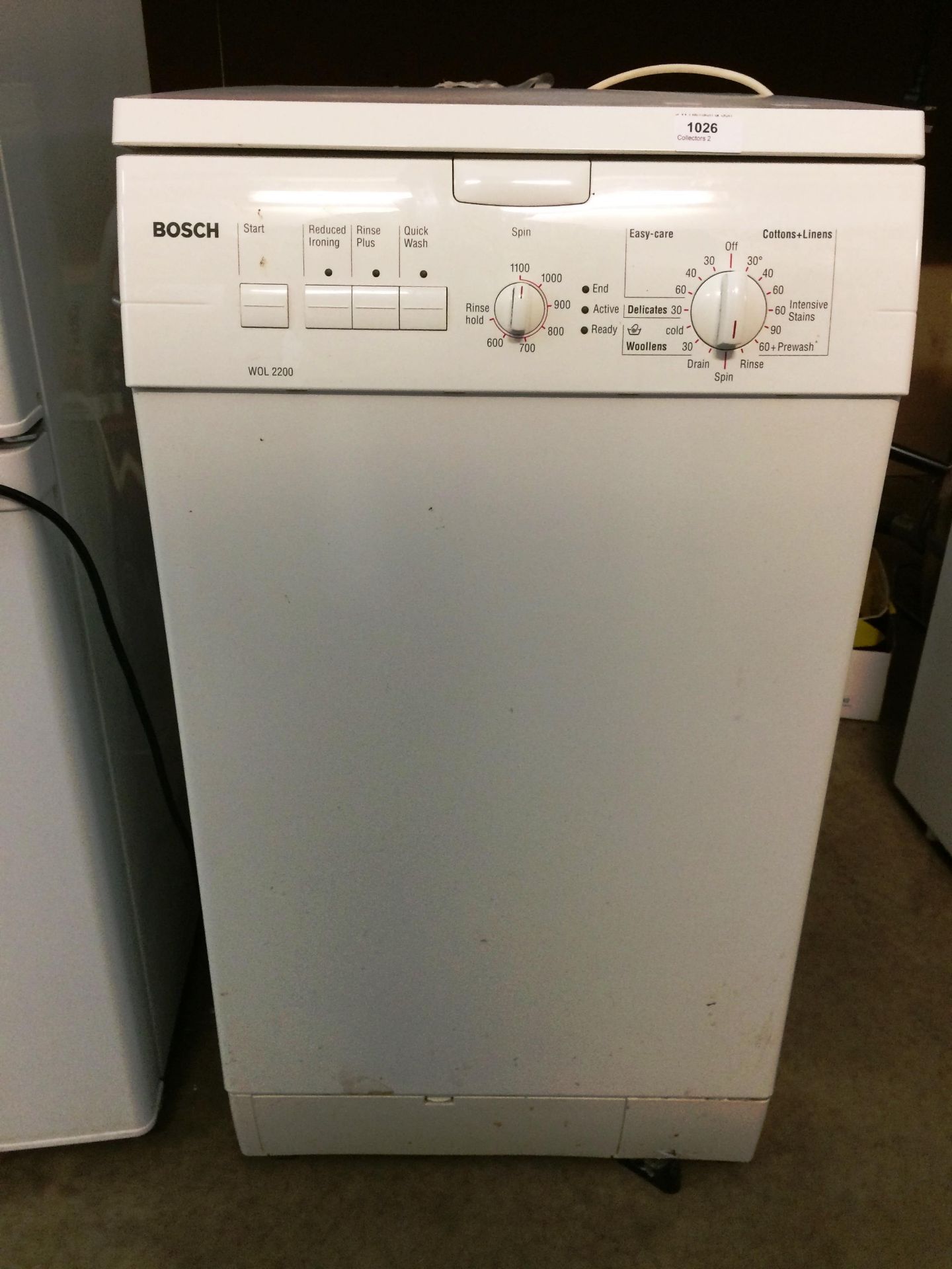 A Bosch WOL2200 top loading automatic washing machine