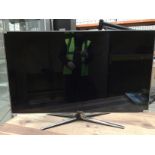 A Samsung UE46D6750WK television complete with remote control