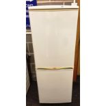 A Swan SR5090 upright fridge freezer