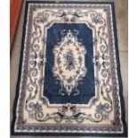 A blue patterned rug 115 x 150cm