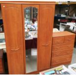 An Alstons light wood finish two piece bedroom suite comprising two door with centre mirror